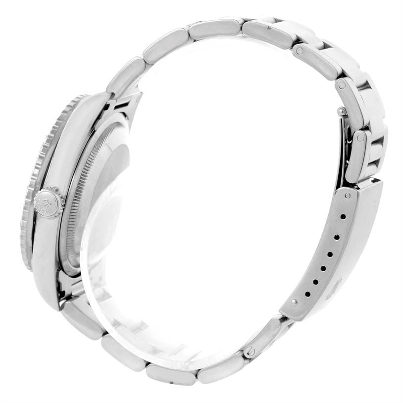 This side view of the Rolex Turn-o-Graph 16264 Men's Stainless Steel White Dial 16264 Men's Stainless Steel White Dial model shows the watch case, crown, and bracelet.