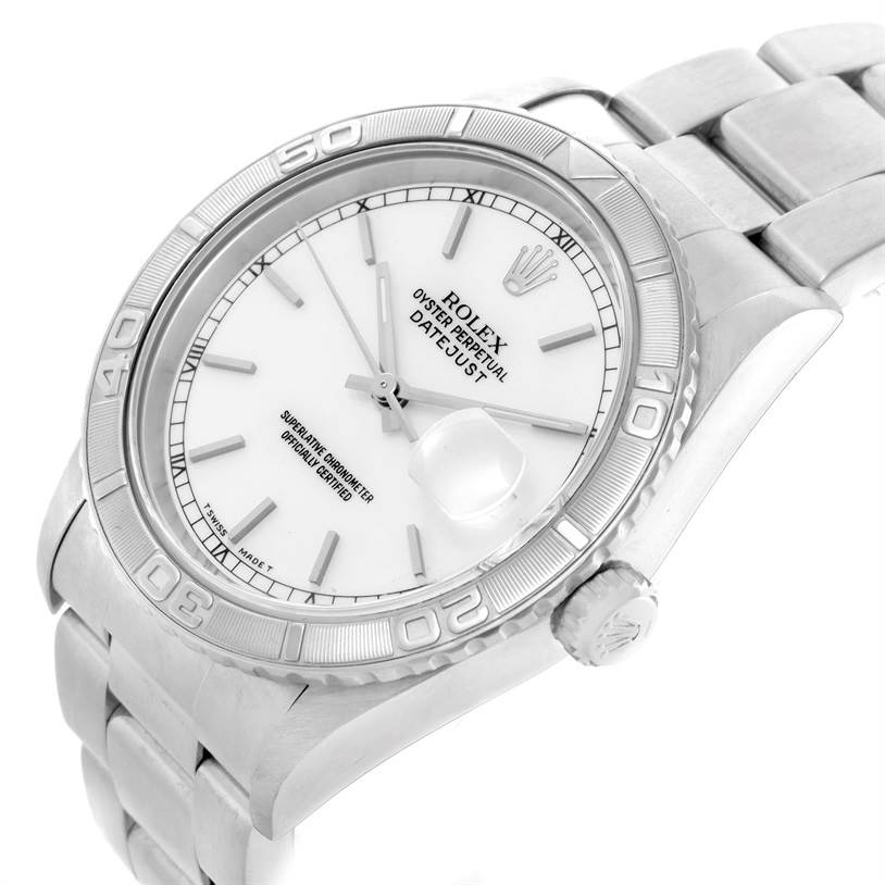 The image shows a Rolex Turn-o-Graph 16264 Men's Stainless Steel White Dial 16264 Men's Stainless Steel White Dial watch from a three-quarter angle, focusing on the dial, bezel, and bracelet.