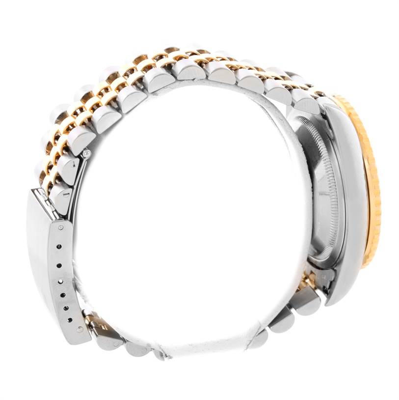 This image shows a side view of a Rolex Turn-o-Graph 16263 Men's Steel and Gold (two tone) White Dial 16263 Men's Steel and Gold (two tone) White Dial watch highlighting its bracelet, clasp, case, and partially visible bezel.