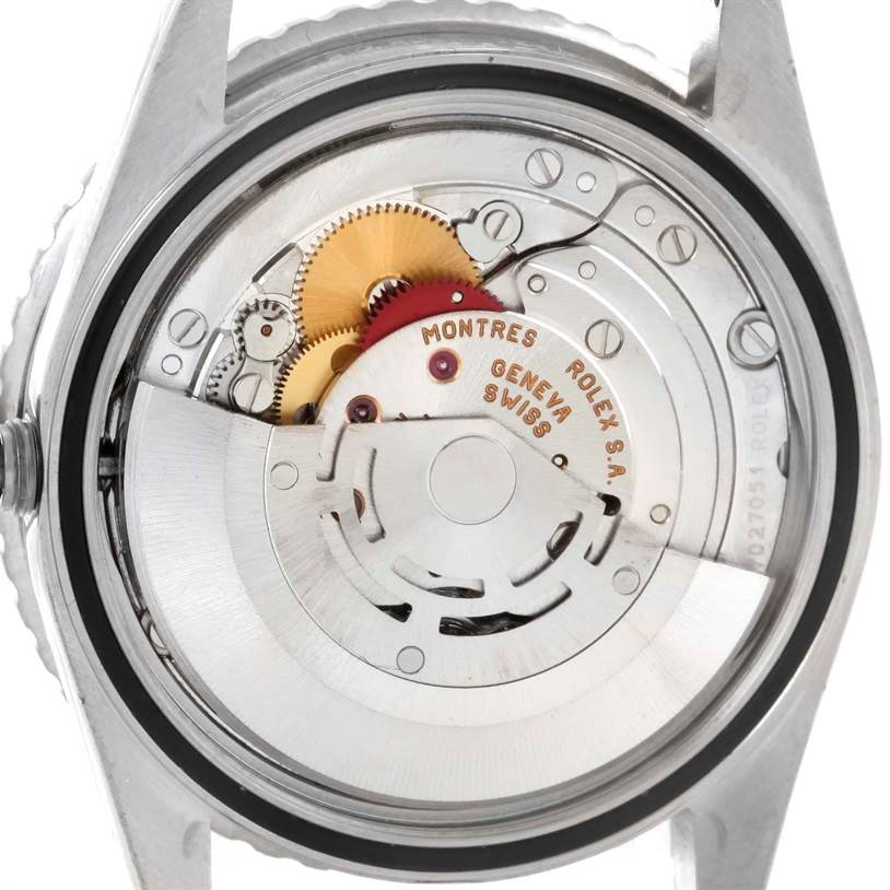 The image shows the internal mechanism of a Turn-o-Graph model by Rolex from a rear-angle view.