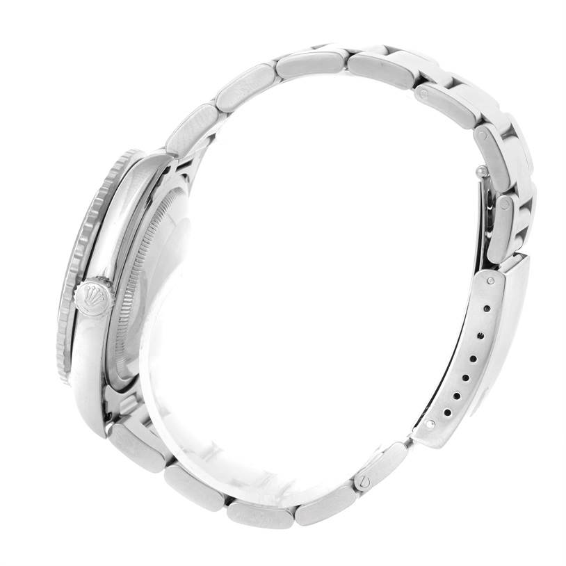 The Rolex Turn-o-Graph 16264 Men's Stainless Steel Black Dial 16264 Men's Stainless Steel Black Dial watch is shown from a side angle, highlighting the bezel, crown, and bracelet links.