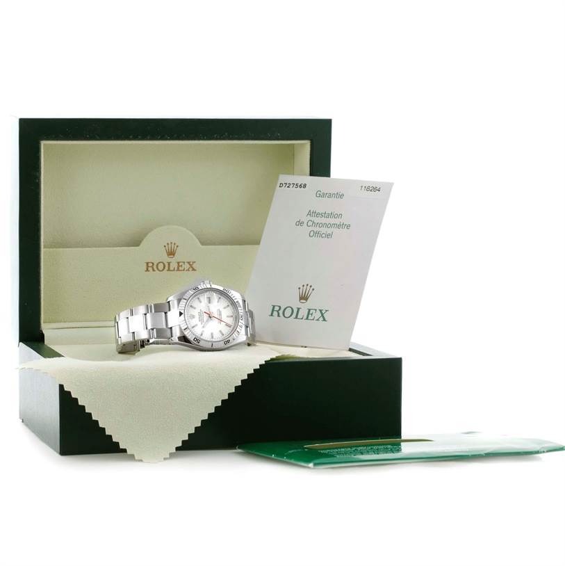 The Rolex Turn-o-Graph 116264 Men
s Stainless Steel White Dial 116264 Men
s Stainless Steel White Dial watch is displayed inside its box with visible documentation and a cloth.