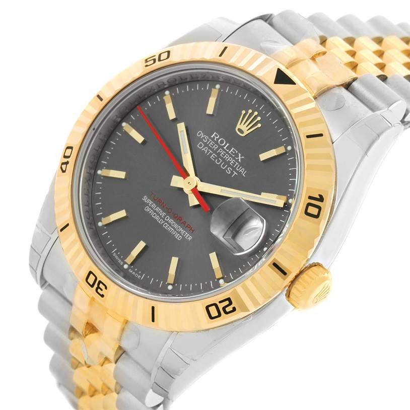 This image shows a Rolex Turn-o-Graph 116263GYSJ Men's Steel and Gold (two tone) Grey Dial 116263GYSJ Men's Steel and Gold (two tone) Grey Dial watch at an angled view, highlighting its gold bezel, crown, and part of the bracelet.