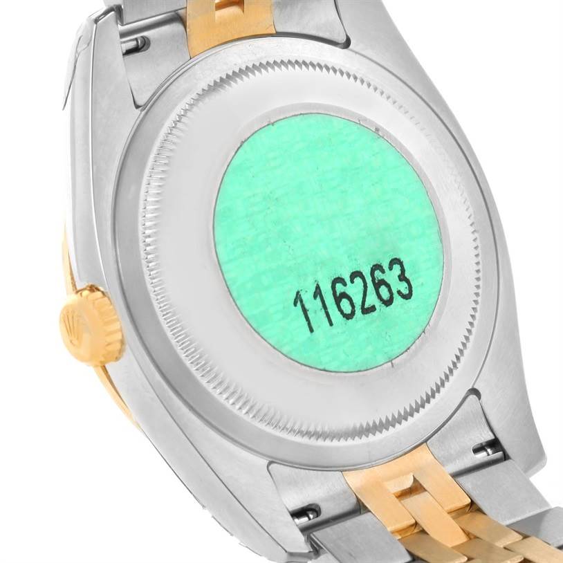 The image shows the back case and part of the bracelet of a Rolex Turn-o-Graph 116263GYSJ Men's Steel and Gold (two tone) Grey Dial 116263GYSJ Men's Steel and Gold (two tone) Grey Dial model watch.