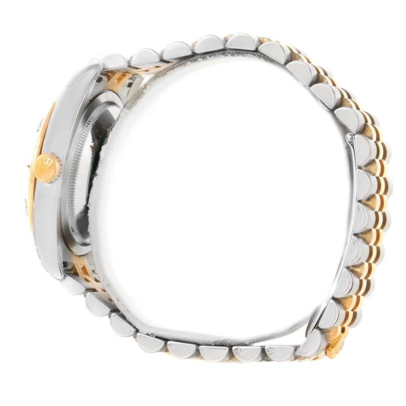 This image shows a side view of the Rolex Turn-o-Graph 116263GYSJ Men's Steel and Gold (two tone) Grey Dial 116263GYSJ Men's Steel and Gold (two tone) Grey Dial watch, highlighting its crown and bracelet.