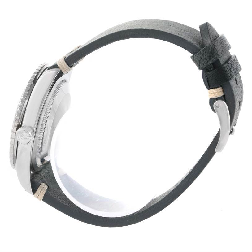 The image shows a side view of a Rolex Turn-o-Graph 16264 Men's Stainless Steel Silver Dial 16264 Men's Stainless Steel Silver Dial watch, highlighting the case, bezel, and leather strap with a buckle.