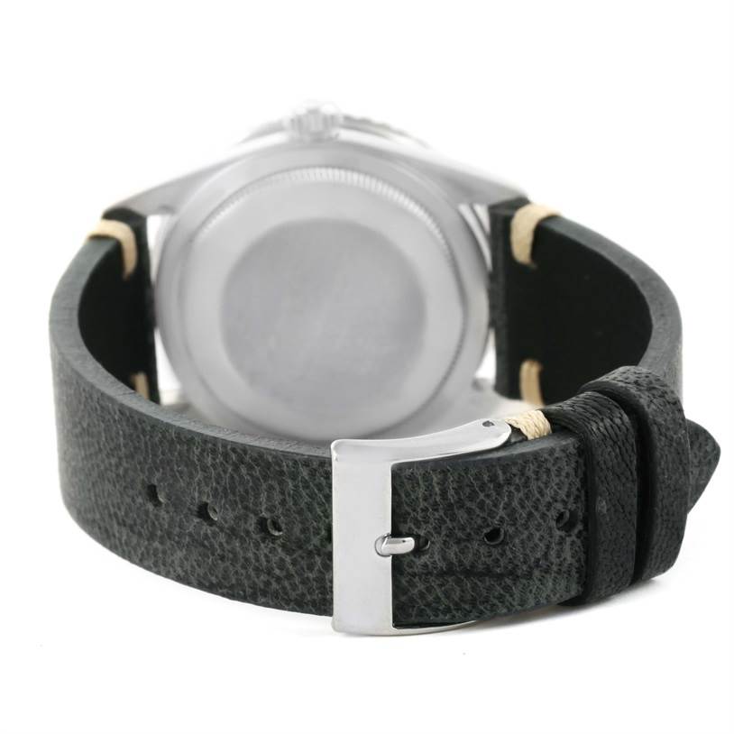 The image shows the back view of a Rolex Turn-o-Graph 16264 Men's Stainless Steel Silver Dial 16264 Men's Stainless Steel Silver Dial watch, focusing on its leather strap and metal buckle.