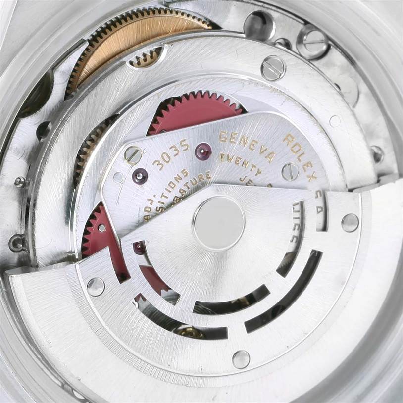 The image shows the intricate inner mechanism and movement of the Rolex Turn-o-Graph 16263 Men's Steel and Gold (two tone) Champagne Dial 16263 Men's Steel and Gold (two tone) Champagne Dial watch, highlighting its detailed gears and components.
