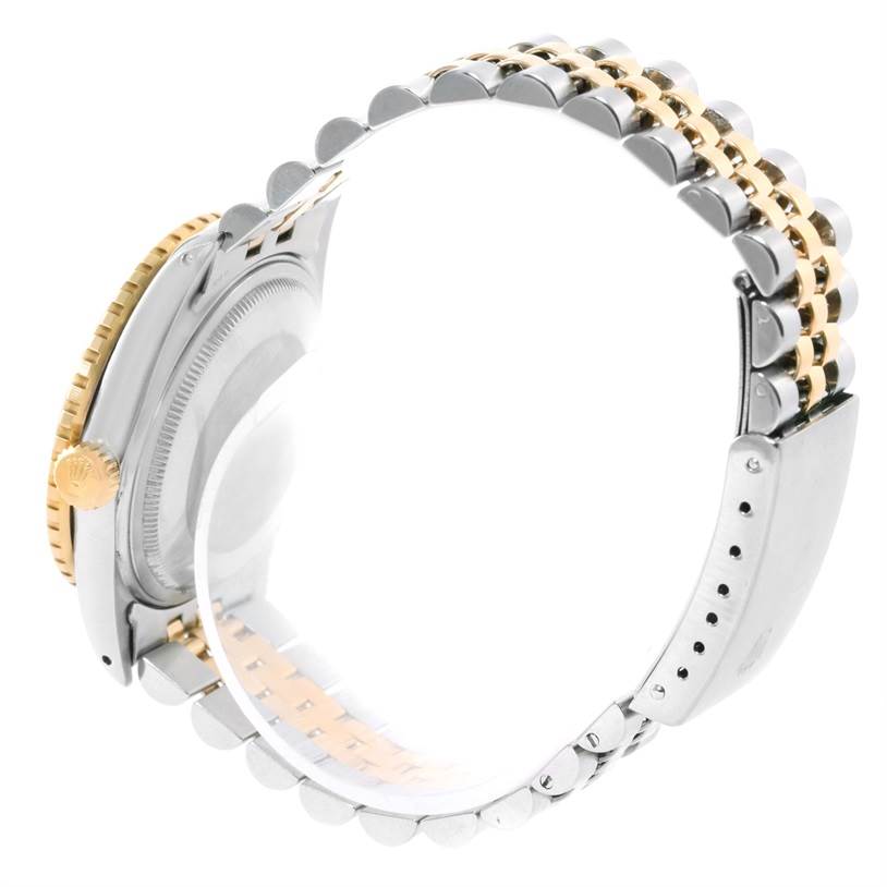 The image shows the side view of a Rolex Turn-o-Graph 16263 Men's Steel and Gold (two tone) Champagne Dial 16263 Men's Steel and Gold (two tone) Champagne Dial watch, highlighting the case, bezel, crown, and part of the bracelet.