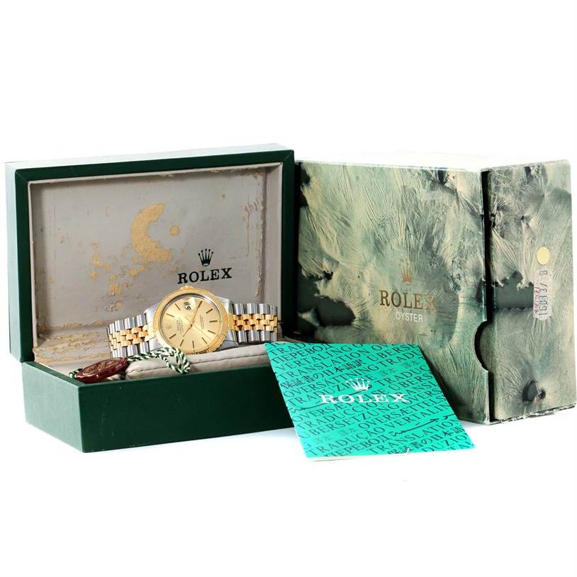 The image shows a Rolex Turn-o-Graph 16263 Men's Steel and Gold (two tone) Champagne Dial 16263 Men's Steel and Gold (two tone) Champagne Dial watch, its box, outer cover, and paperwork from a front angle.