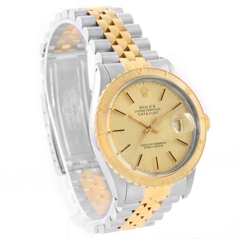 The image shows a Rolex Turn-o-Graph 16263 Men's Steel and Gold (two tone) Champagne Dial 16263 Men's Steel and Gold (two tone) Champagne Dial watch at a three-quarter angle, highlighting its dial, bezel, and two-tone metal bracelet.