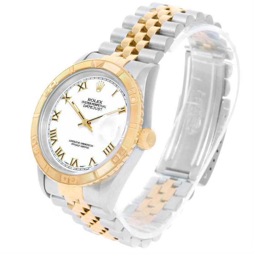 The Rolex Turn-o-Graph 16263 Men
s Steel and Gold (two tone) White Dial 16263 Men
s Steel and Gold (two tone) White Dial watch is shown at an angle displaying the face, bezel, crown, and two-tone bracelet.