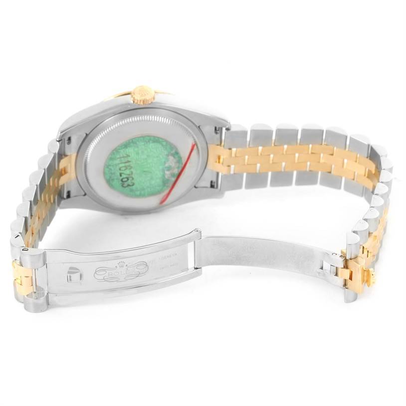 This image shows the open back view of a Rolex Turn-o-Graph 116263 Men's Stainless Steel White Dial 116263 Men's Stainless Steel White Dial watch, displaying its clasp and partial bracelet.