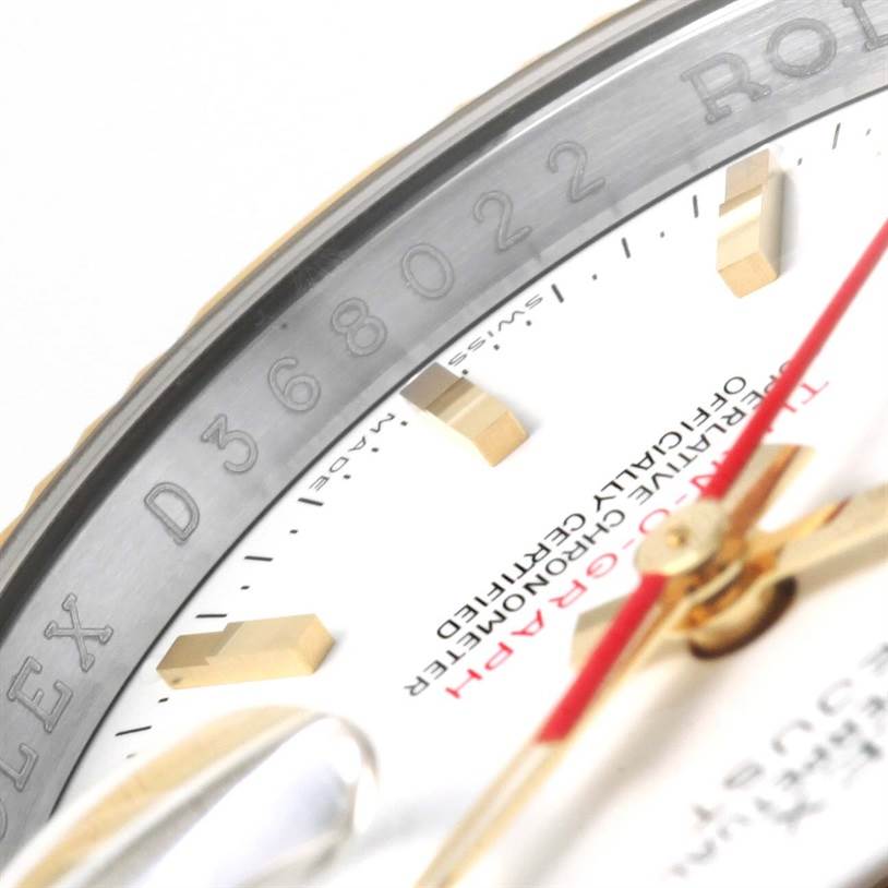 The close-up image shows the bezel, part of the dial, and the red second hand of the Rolex Turn-o-Graph 116263 Men's Stainless Steel White Dial 116263 Men's Stainless Steel White Dial model.
