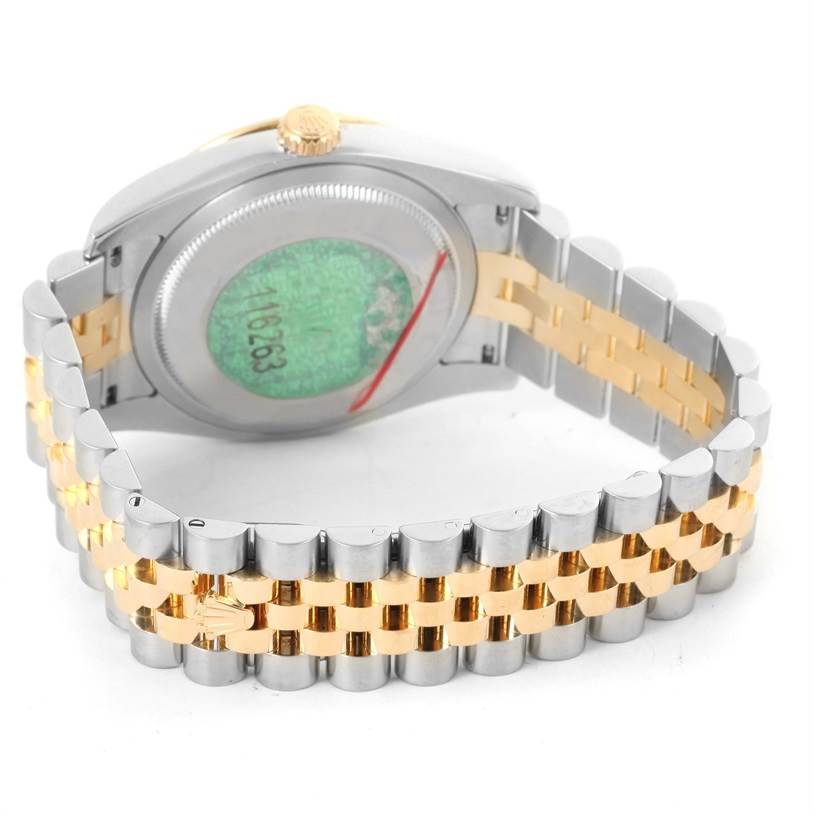 This image shows the back and part of the bracelet of a Rolex Turn-o-Graph 116263 Men's Stainless Steel White Dial 116263 Men's Stainless Steel White Dial watch from a slightly angled perspective.