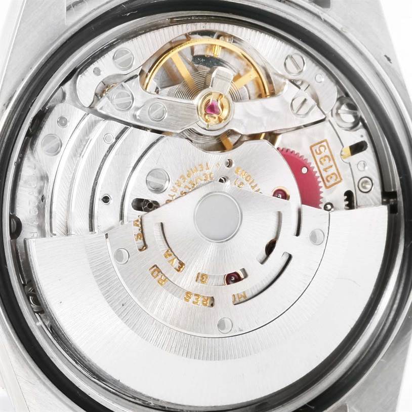 This image shows a close-up view of the movement mechanism of a Rolex Turn-o-Graph 16264 Men
s Stainless Steel White Dial 16264 Men
s Stainless Steel White Dial watch.