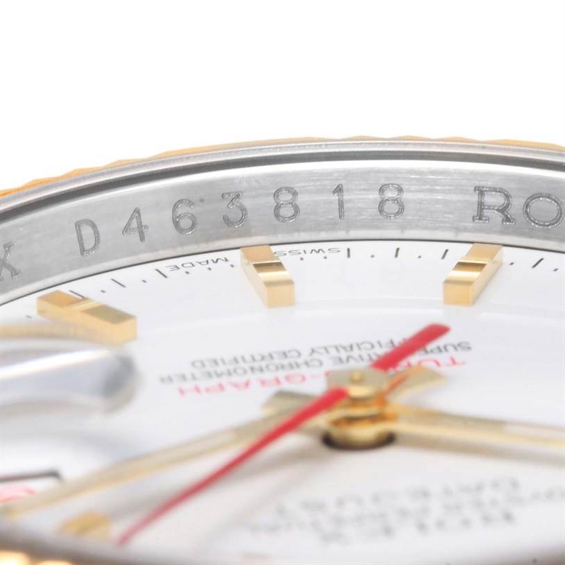 The close-up angle shows the inner bezel and partial dial of the Rolex Turn-o-Graph 116263 Men's Stainless Steel White Dial 116263 Men's Stainless Steel White Dial watch, including the model's serial number.