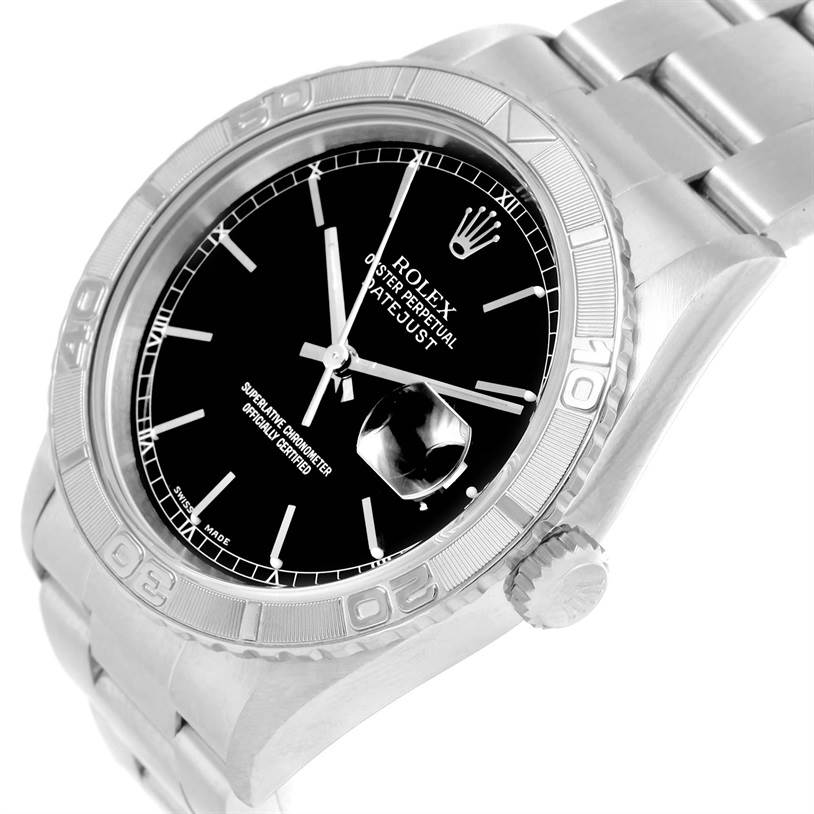 The image shows a Turn-o-Graph model Rolex watch from a three-quarter angle, highlighting the bezel, dial, and part of the bracelet.