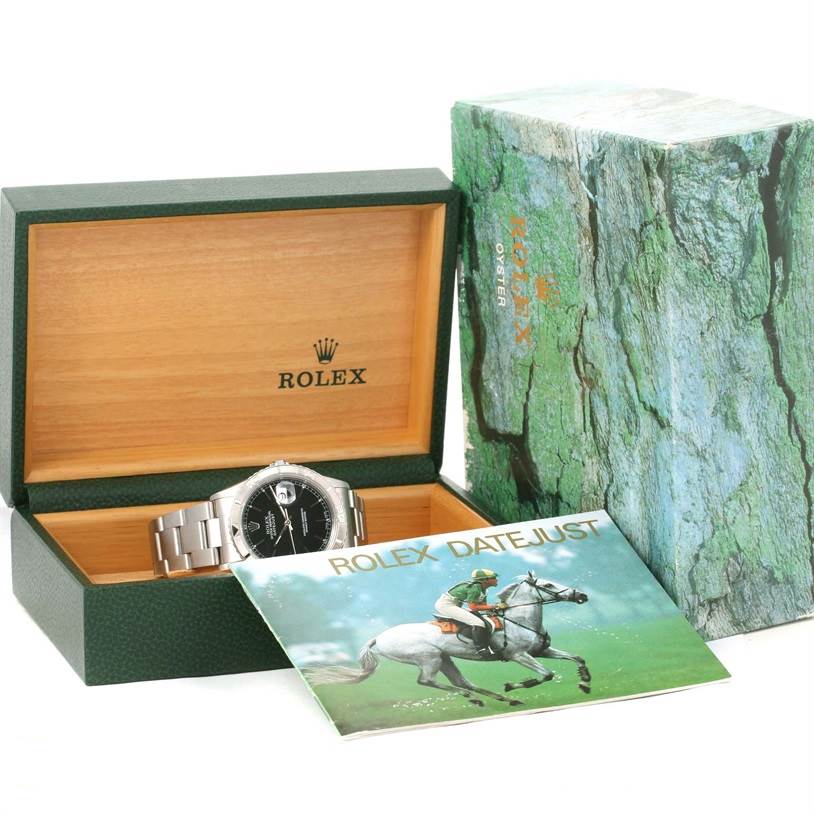 The image shows the Rolex Turn-o-Graph 16264 Men's Stainless Steel Black Dial 16264 Men's Stainless Steel Black Dial watch within its open box, along with its outer packaging and user manual.