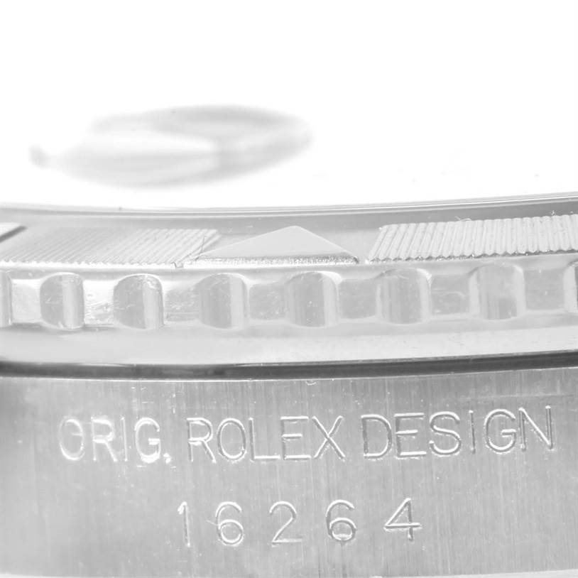 This image shows a close-up of the bezel and case of the Rolex Turn-o-Graph 16264 Men's Stainless Steel Black Dial 16264 Men's Stainless Steel Black Dial model, displaying the engraving "ORIG. ROLEX DESIGN 16264."