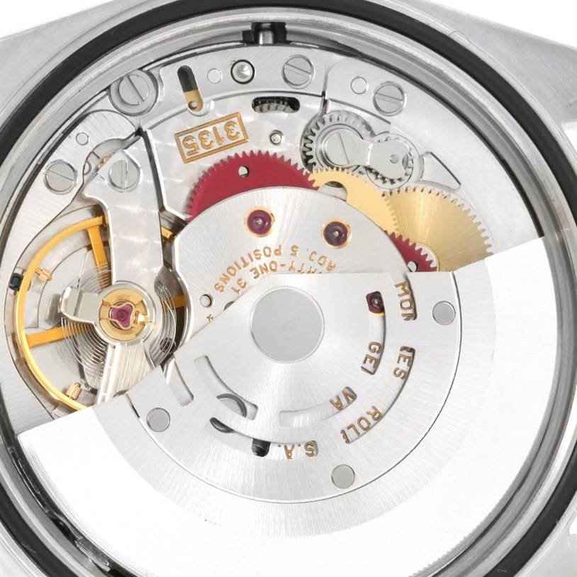 This image shows a close-up of the Rolex Turn-o-Graph 16264 Men's Stainless Steel Black Dial 16264 Men's Stainless Steel Black Dial's movement from the back, revealing gears and mechanical parts.