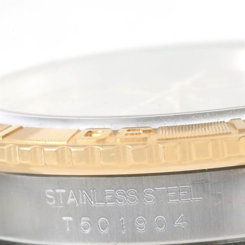 The image shows a detailed close-up of the stainless steel case and gold bezel of a Rolex Turn-o-Graph 16263 Men's Steel and Gold (two tone) Grey Dial 16263 Men's Steel and Gold (two tone) Grey Dial watch.