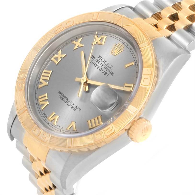 The image shows a side and partial top view of the Rolex Turn-o-Graph 16263 Men's Steel and Gold (two tone) Grey Dial 16263 Men's Steel and Gold (two tone) Grey Dial watch, highlighting its bezel, dial, and two-tone bracelet.
