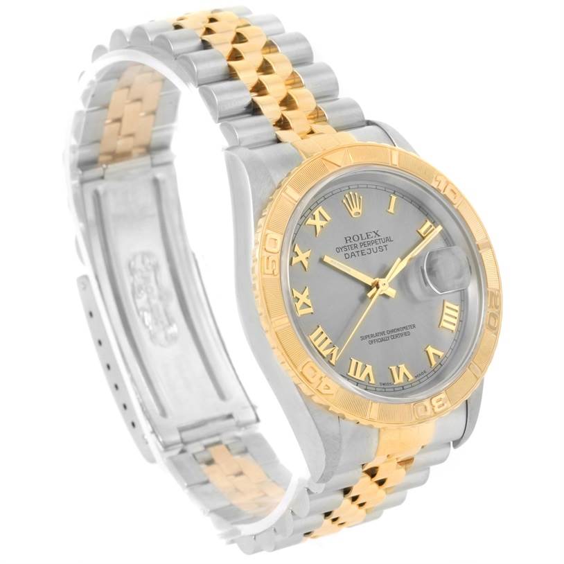 This image shows a Rolex Turn-o-Graph 16263 Men's Steel and Gold (two tone) Grey Dial 16263 Men's Steel and Gold (two tone) Grey Dial watch at a three-quarter angle, highlighting its two-tone bracelet, face, and bezel.