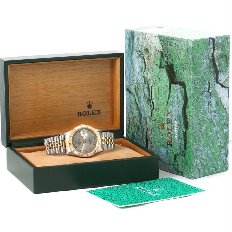 The image shows a Rolex Turn-o-Graph 16263 Men's Steel and Gold (two tone) Grey Dial 16263 Men's Steel and Gold (two tone) Grey Dial watch in its open box along with the outer packaging and booklets.
