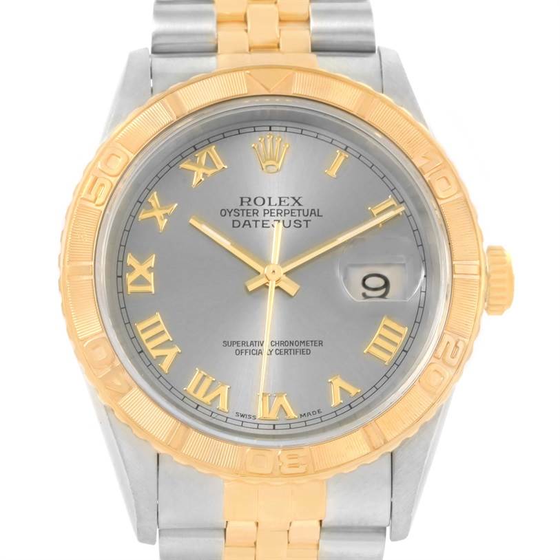 The image shows a front view of a Rolex Turn-o-Graph 16263 Men's Steel and Gold (two tone) Grey Dial 16263 Men's Steel and Gold (two tone) Grey Dial watch highlighting its dial, bezel, and part of the bracelet.