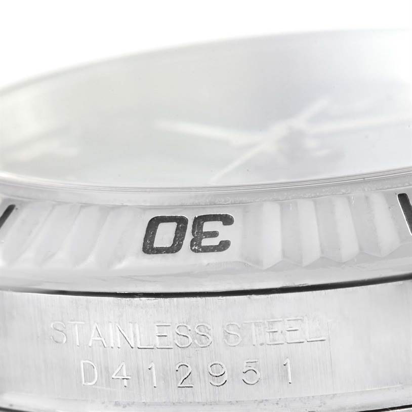 This image shows a close-up of the bezel and case side with a serial number on a Rolex Turn-o-Graph 116264 Men's Stainless Steel Blue Dial 116264 Men's Stainless Steel Blue Dial watch.