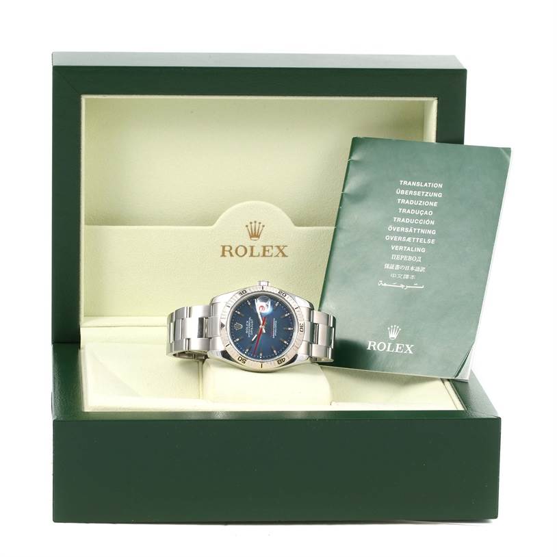 The image shows a Rolex Turn-o-Graph 116264 Men's Stainless Steel Blue Dial 116264 Men's Stainless Steel Blue Dial watch inside an open green Rolex box, with a manual booklet on the side.