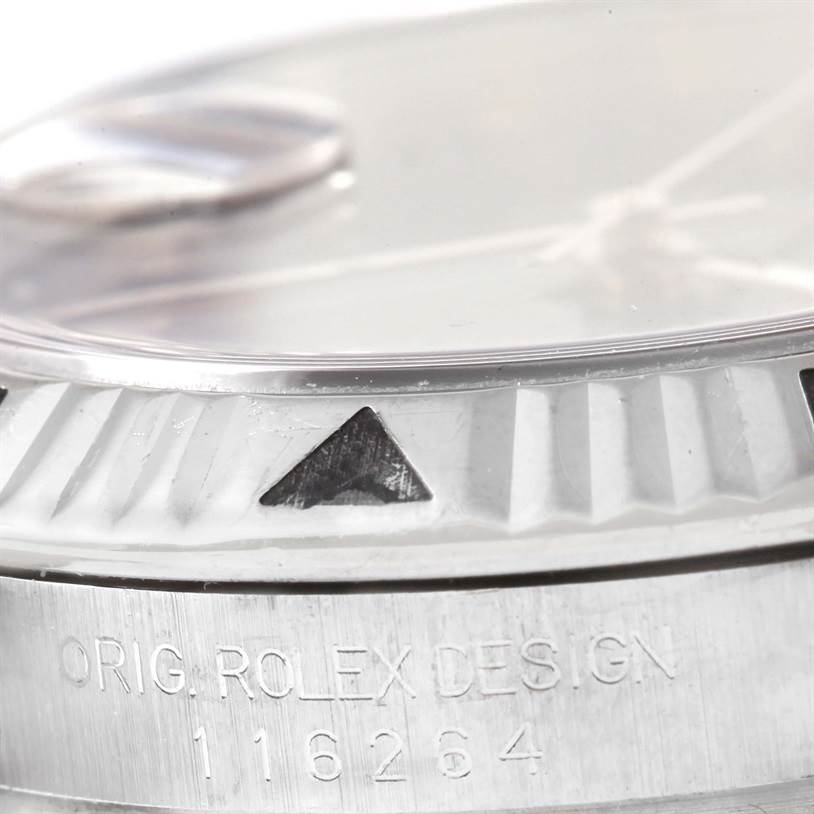 The image shows a close-up side view of the bezel and engraved model number on a Rolex Turn-o-Graph 116264 Men's Stainless Steel Blue Dial 116264 Men's Stainless Steel Blue Dial watch.