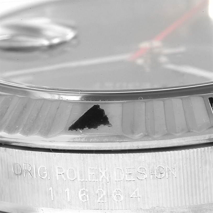 The image shows a close-up of the bezel, dial, and case number of a Rolex Turn-o-Graph 116264 Men's Stainless Steel Black Dial 116264 Men's Stainless Steel Black Dial model.