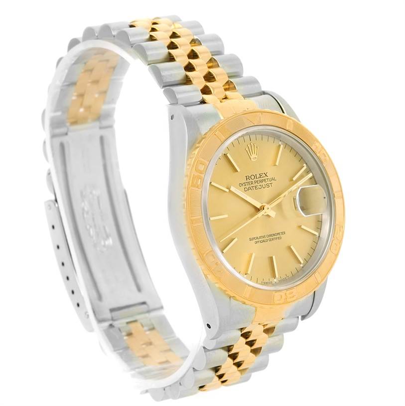 The image shows a side-angle view of a Rolex Turn-o-Graph 16263 Men's Steel and Gold (two tone) Champagne Dial 16263 Men's Steel and Gold (two tone) Champagne Dial watch, highlighting the bi-metal strap, gold bezel, and dial.