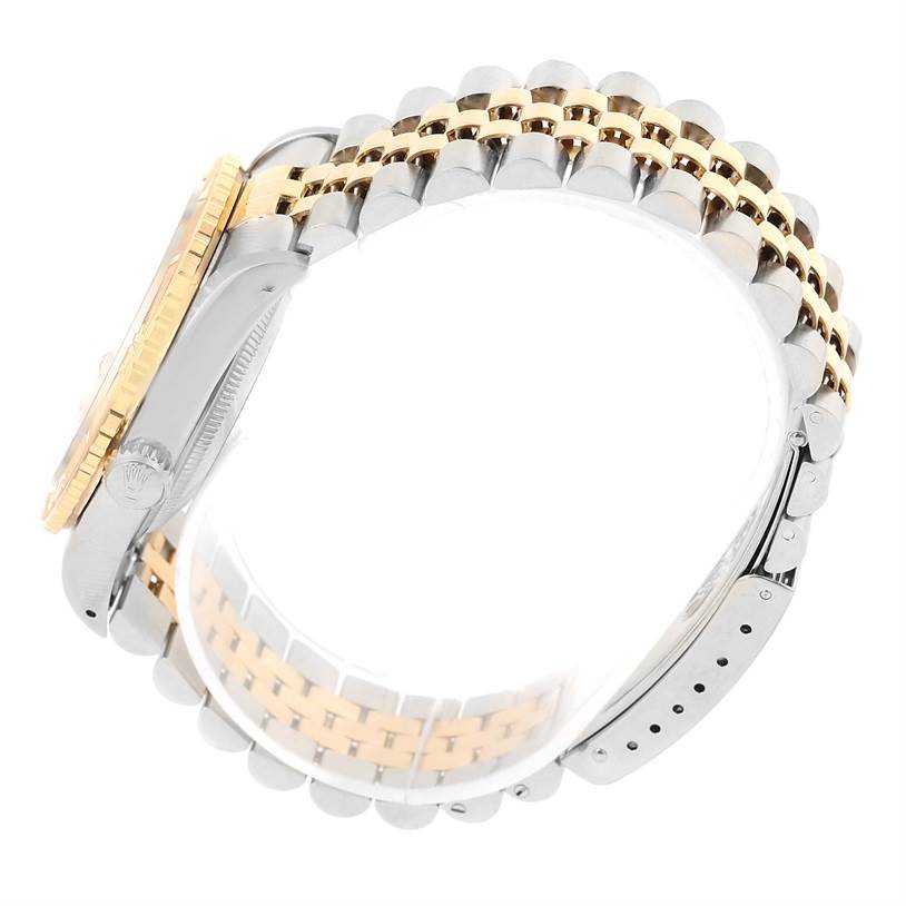 This image shows a side view of the Rolex Turn-o-Graph 16263 Men's Steel and Gold (two tone) Champagne Dial 16263 Men's Steel and Gold (two tone) Champagne Dial watch, highlighting its two-tone bracelet, bezel, and crown.