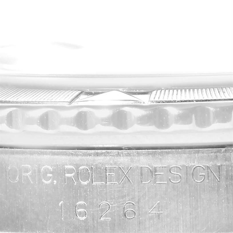 This close-up image of the Rolex Turn-o-Graph 16264 Men's Stainless Steel Blue Dial 16264 Men's Stainless Steel Blue Dial watch shows the bezel edge and the engraved model number "16264".