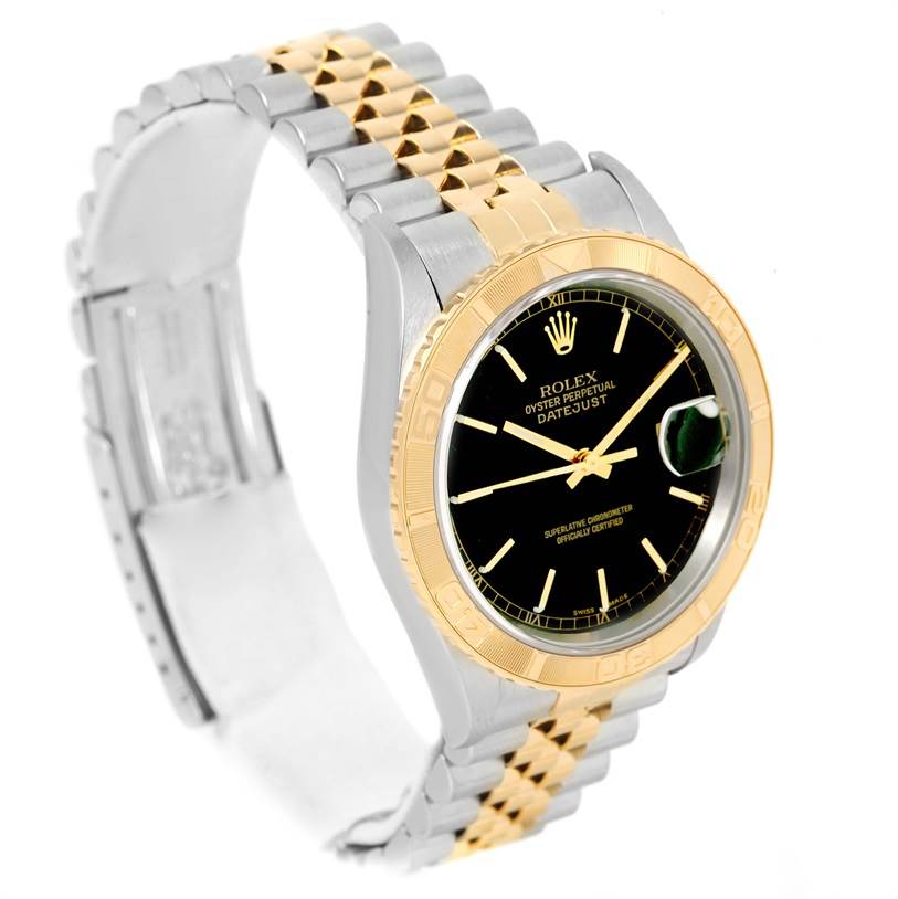 The image shows a Rolex Turn-o-Graph 16263 Men
s Steel and Gold (two tone) Black Dial 16263 Men
s Steel and Gold (two tone) Black Dial watch at an angle highlighting its face, bezel, and two-tone bracelet.