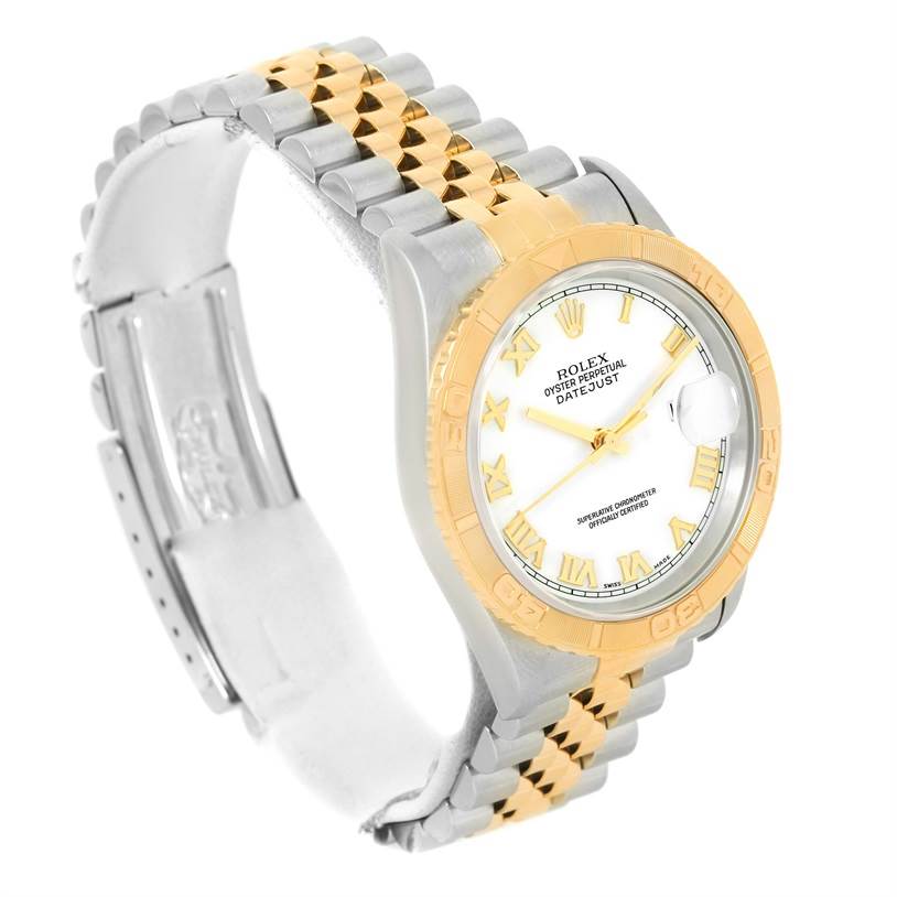 This image shows a Rolex Turn-o-Graph 16263 Men's Steel and Gold (two tone) White Dial 16263 Men's Steel and Gold (two tone) White Dial watch at a tilted side angle, highlighting its bezel, dial, and bi-metal bracelet.