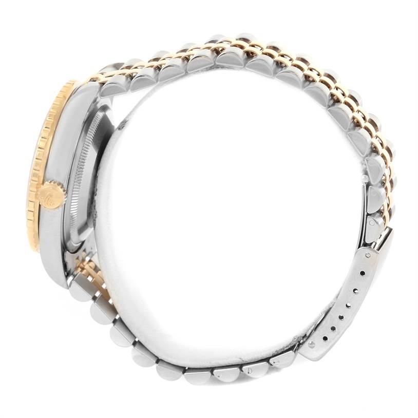 This image shows a side angle of a Rolex Turn-o-Graph 16263 Men's Steel and Gold (two tone) White Dial 16263 Men's Steel and Gold (two tone) White Dial watch, highlighting the bezel, crown, and bracelet.