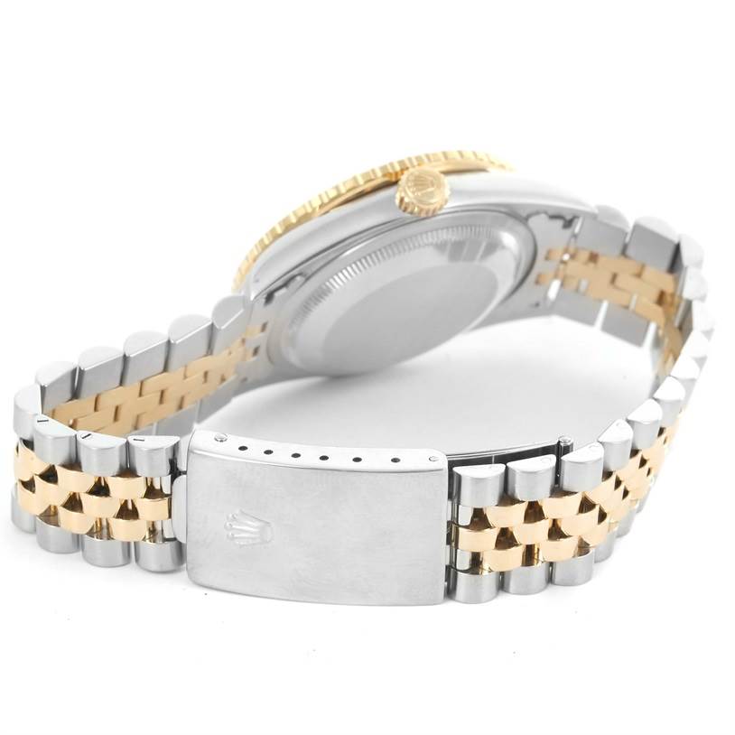 The image shows the back of a Rolex Turn-o-Graph 16263 Men's Steel and Gold (two tone) White Dial 16263 Men's Steel and Gold (two tone) White Dial watch, highlighting its bracelet and closed clasp.