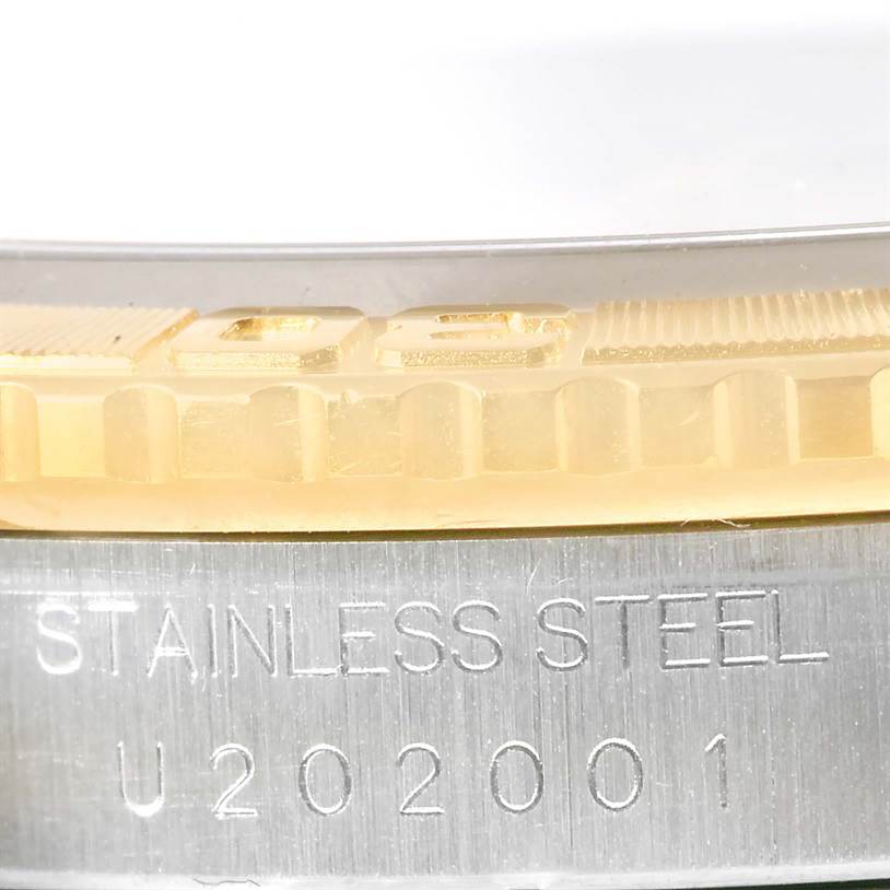 This close-up image shows the stainless steel case and the edge of the bezel of a Rolex Turn-o-Graph 16263 Men's Steel and Gold (two tone) White Dial 16263 Men's Steel and Gold (two tone) White Dial watch.