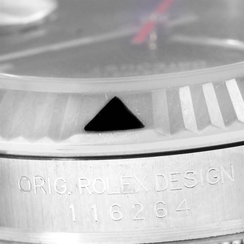 The image shows a close-up of the bezel and serial number of the Rolex Turn-o-Graph 116264 Men
s Stainless Steel Black Dial 116264 Men
s Stainless Steel Black Dial model 116264.