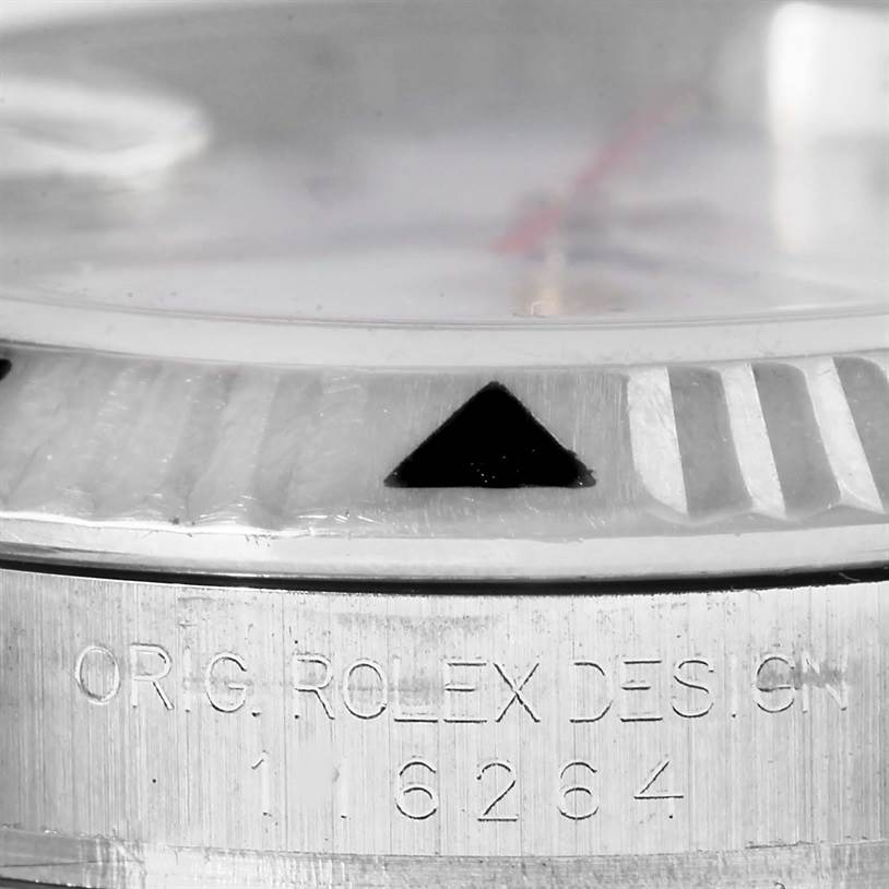 This image shows a close-up of the bezel and case of a Rolex Turn-o-Graph 116264 Men
s Stainless Steel White Dial 116264 Men
s Stainless Steel White Dial model, displaying the model number engraved on the case side.