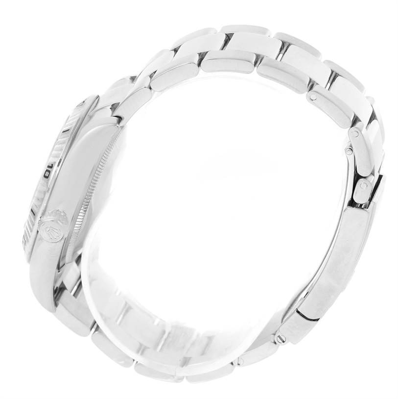 The image shows a side view of the Rolex Turn-o-Graph 116264 Men
s Stainless Steel White Dial 116264 Men
s Stainless Steel White Dial watch, focusing on the bracelet and the side of the case.