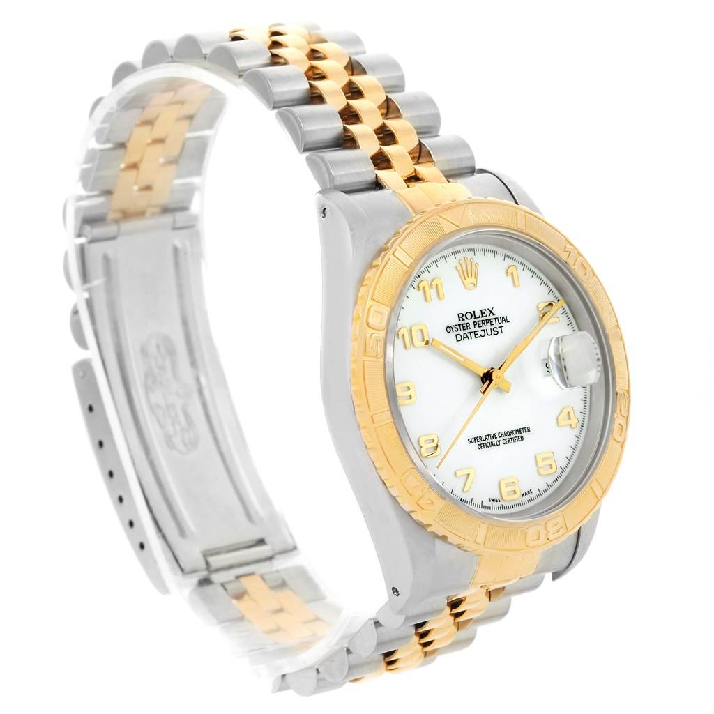 The image shows a side angle of the Rolex Turn-o-Graph 16263 Men
s Steel and Gold (two tone) White Dial 16263 Men
s Steel and Gold (two tone) White Dial watch, highlighting the bezel, dial, and part of the bracelet.
