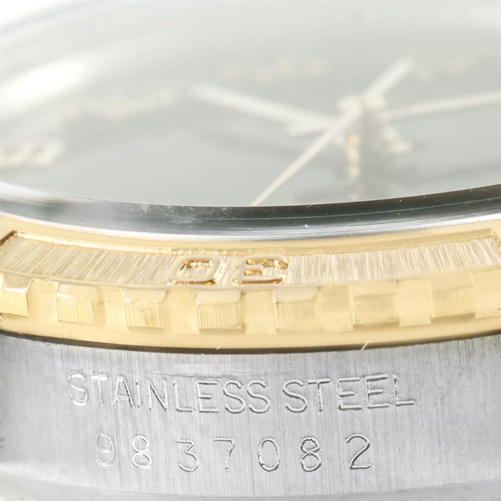 The image shows a close-up view of the bezel, crystal, and case of the Rolex Turn-o-Graph 16253 Men's Steel and Gold (two tone) Black Dial 16253 Men's Steel and Gold (two tone) Black Dial watch.