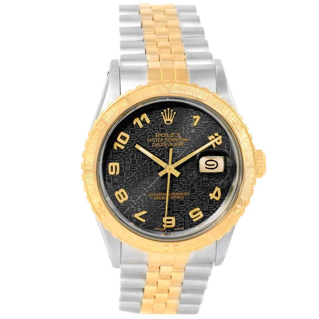 The Rolex Turn-o-Graph 16253 Men's Steel and Gold (two tone) Black Dial 16253 Men's Steel and Gold (two tone) Black Dial watch is shown from a front angle, displaying the face, bezel, and part of its bracelet.