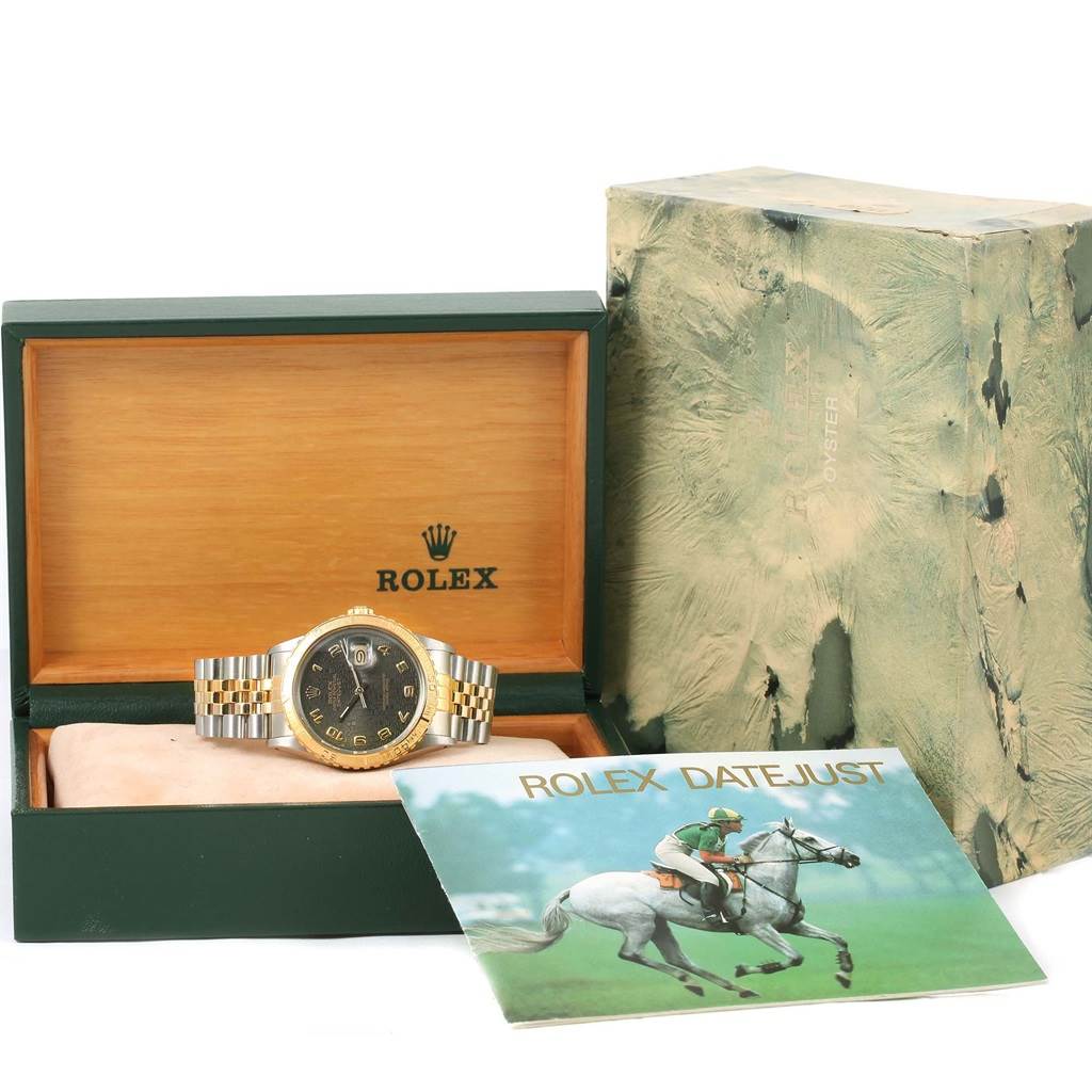 The image shows a Rolex Turn-o-Graph 16253 Men's Steel and Gold (two tone) Black Dial 16253 Men's Steel and Gold (two tone) Black Dial watch in its box, alongside the outer box and a "Rolex Datejust" pamphlet.