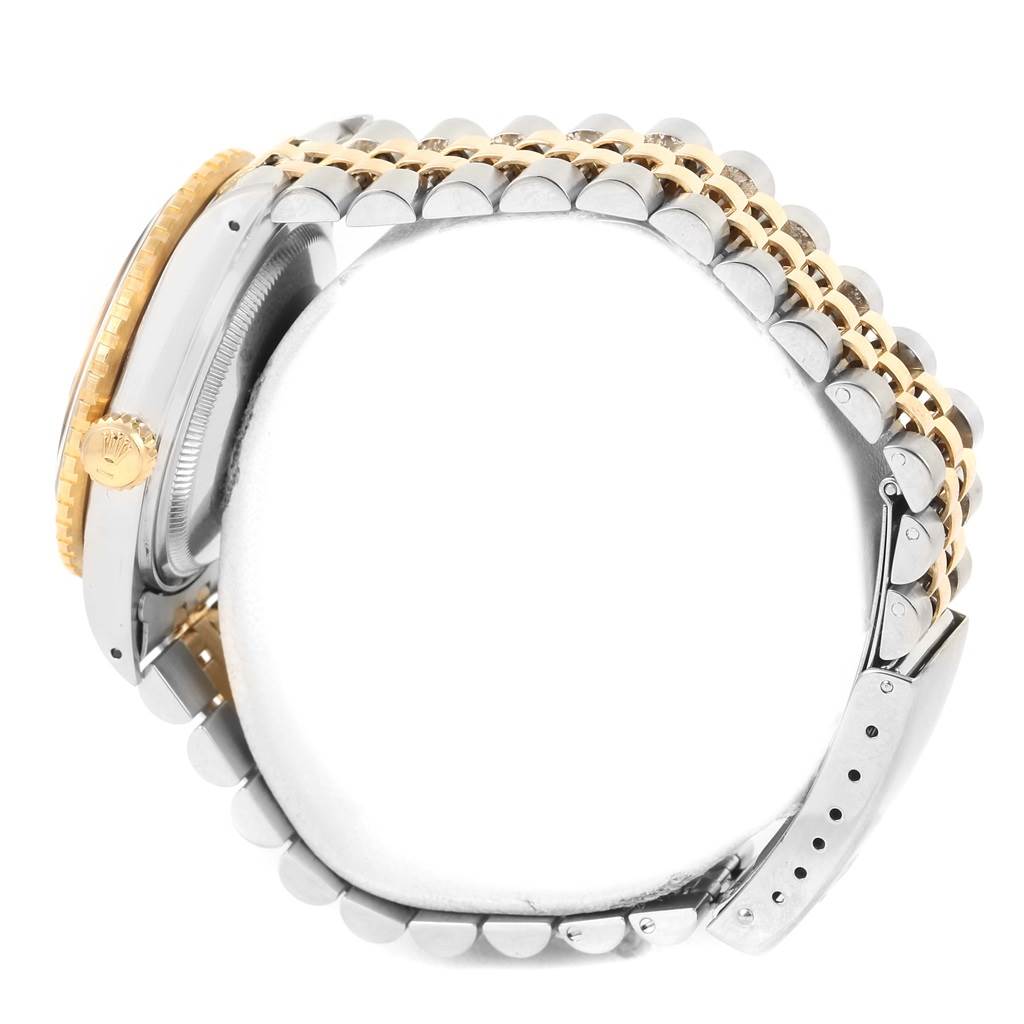 This image shows a side view of a Rolex Turn-o-Graph 16253 Men's Steel and Gold (two tone) Black Dial 16253 Men's Steel and Gold (two tone) Black Dial watch, highlighting its crown, bezel, and bracelet.